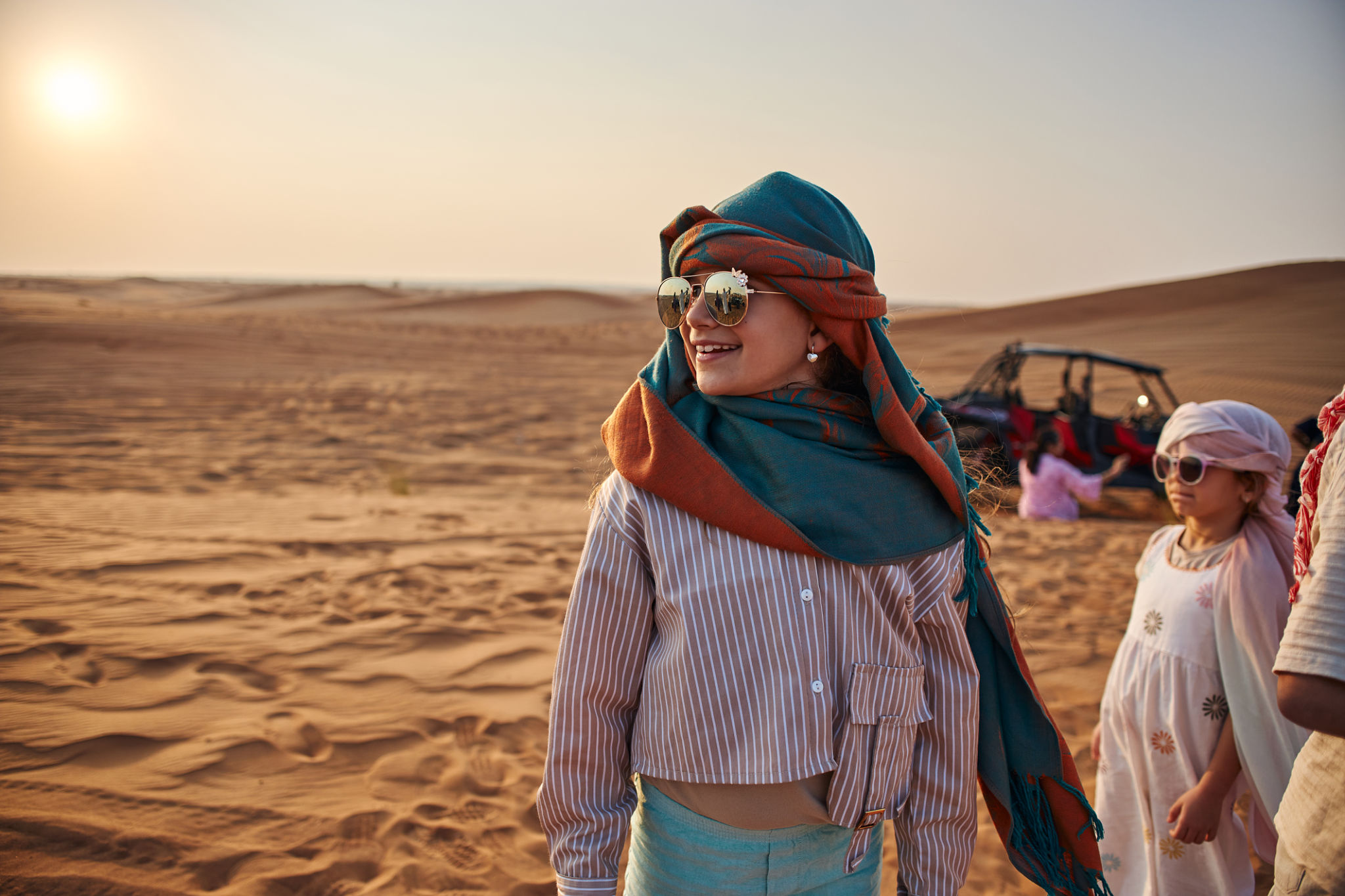 4x4 dune bashing at sunset during a Premium Desert Safari with BBQ Dinner in Dubai